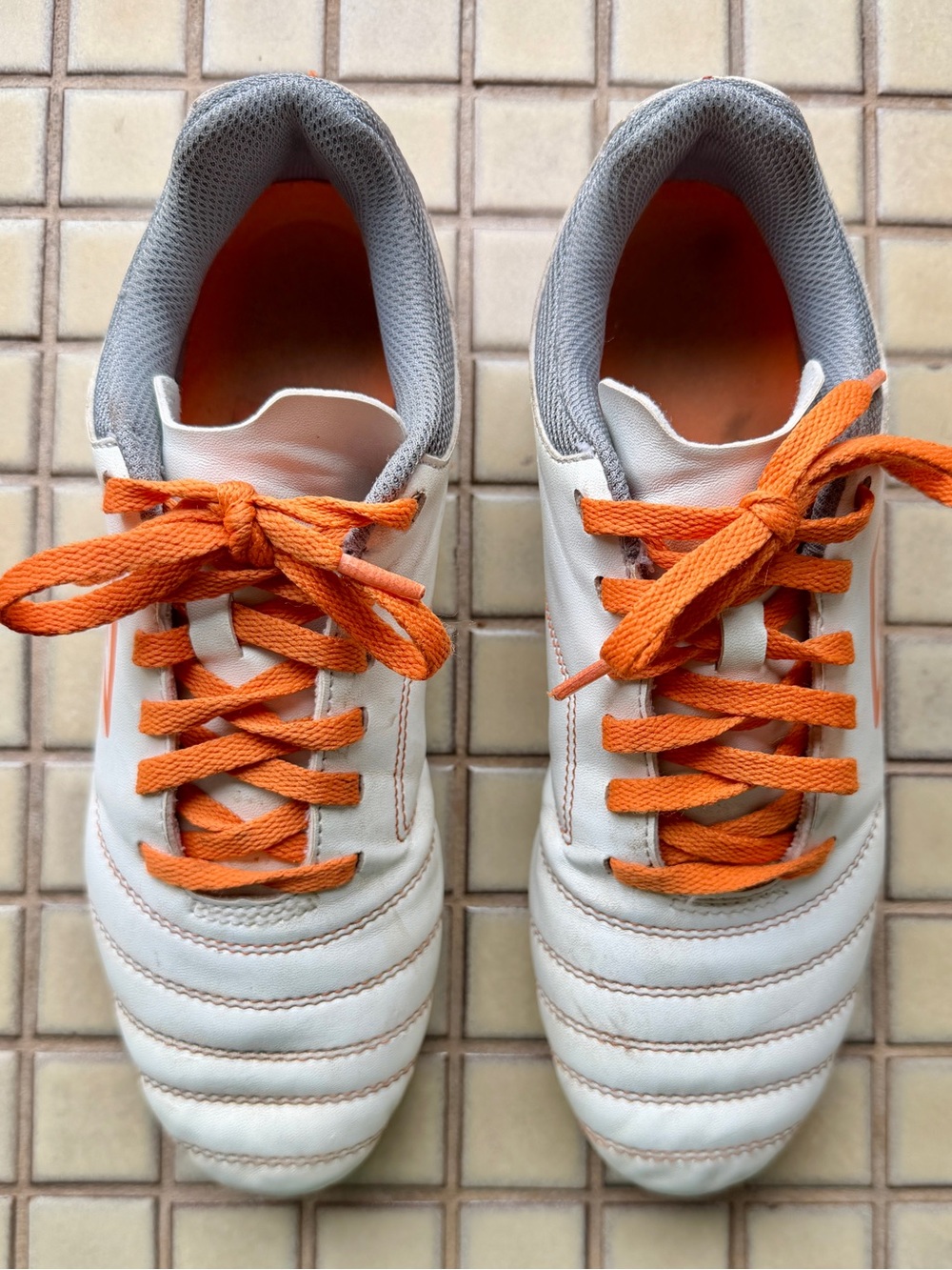 Umbro White Athletic Sneakers with Orange Laces